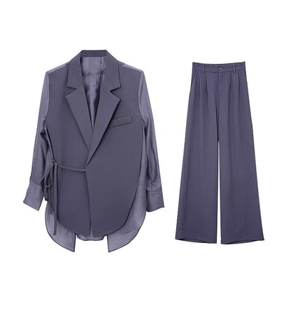 Summer new sun protection temperament fashion suit suit female design sense casual loose top trousers two-piece tide