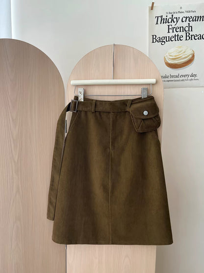 Japanese/Korean "Miu-style" retro polka-dot corduroy skirt (short-to-mid length) for women; versatile straight-cut A-line style featuring a waist bag—perfect for autumn and winter.