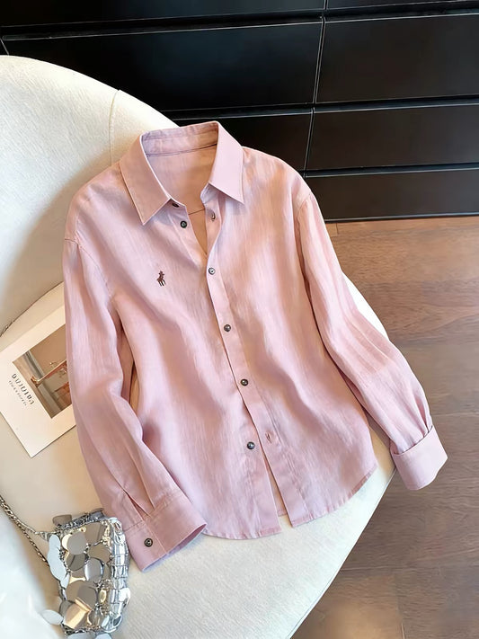 French-style soft purple collared shirt featuring small pony embroidery; a lightweight, loose-fitting, and versatile unisex piece perfect for a relaxed, laid-back look in spring and autumn.