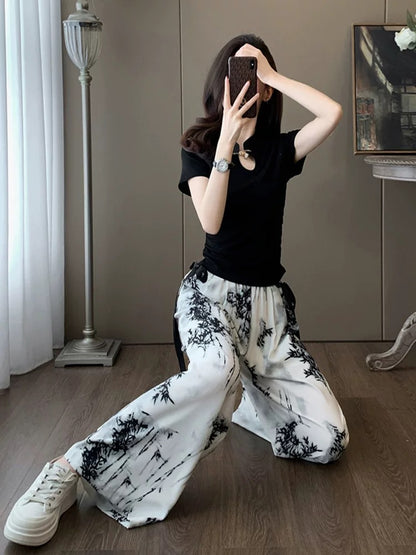Short-sleeved sports casual suit for women, summer fashion, age-reducing internet celebrity, street style, chiffon wide-leg pants, two-piece set, western style