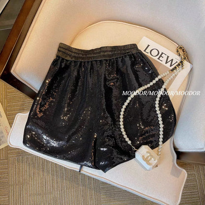 Black sequined shorts women's summer shiny elastic waist drawstring A-line fried street hot pants European high-end pants