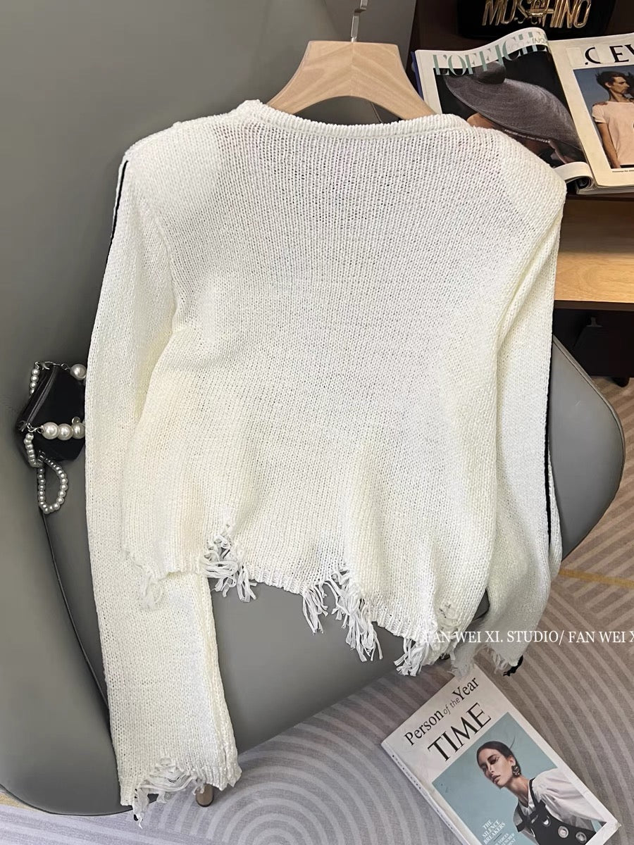Autumn new hot girl hollow loose and versatile tassel shoulder pad pullover round neck long-sleeved sweater women's short top (B2213)