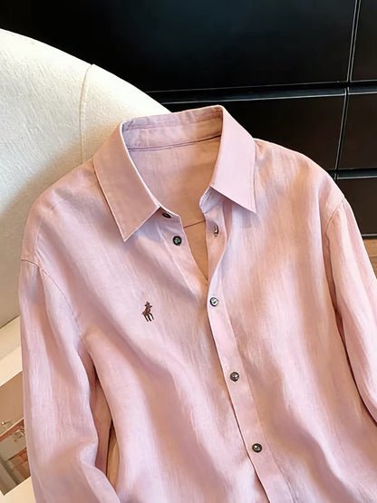 French-style soft purple collared shirt featuring small pony embroidery; a lightweight, loose-fitting, and versatile unisex piece perfect for a relaxed, laid-back look in spring and autumn.