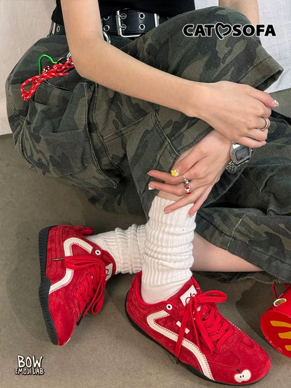 Cat & Sofa “Emoji-Lab” Red Apple Sneakers 🍎👟 Retro racer style with a slim sole for a lightweight, flexible feel. Eye-catching red that elevates any outfit — sporty, trendy, and perfect for matching couple looks.