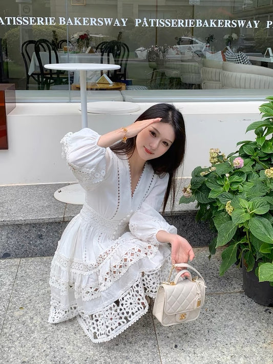 Juicecola white v-neck lace hollow long-sleeved dress for women spring and autumn French heavy industry high-end a-line skirt D071