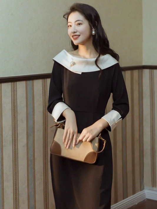 Autumn women's French design niche retro one-line collar black dress Hepburn style little black skirt dress