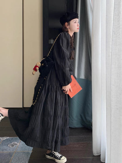 Black textured dress autumn women's 2023 new French retro light mature Hepburn style long A-line skirt trendy