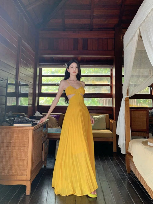 French dopamine holiday style yellow suspender dress female summer seaside sexy backless atmosphere long skirt