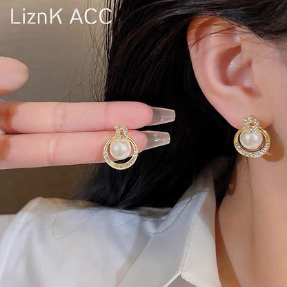 s925 silver needle unique high-end light luxury pearl earrings 2023 trendy niche design sense net red earrings ươmen