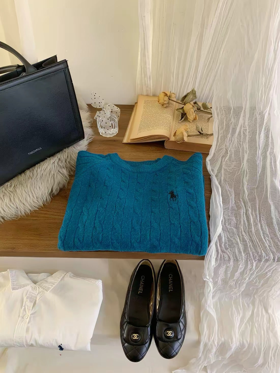 Women's thick, cable-knit pullover sweater featuring embroidery; suitable for layering or wearing as an outer top, with a trendy Korean-style aesthetic.