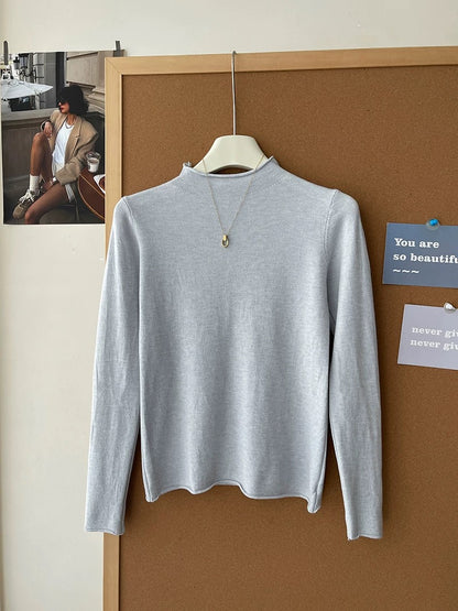 Retro soft and sticky cashmere rolled-edge turtleneck knit sweater for women, autumn and winter, gentle and versatile layering base layer top.