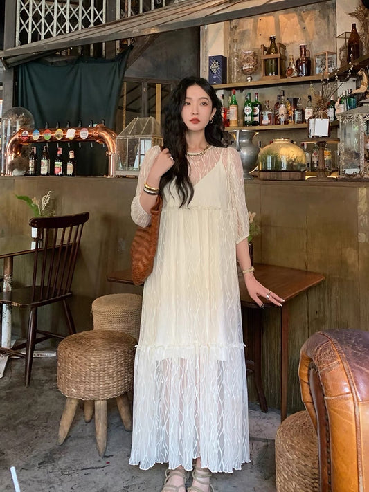 Ren Xiaoyi's vacation wind fairy long skirt net gauze French temperament unique design beige dress female high-end sense