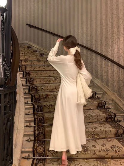 Tongse | Charming thoughts, the king of inner wear! Autumn and winter simple commuting white long skirt with coat dress