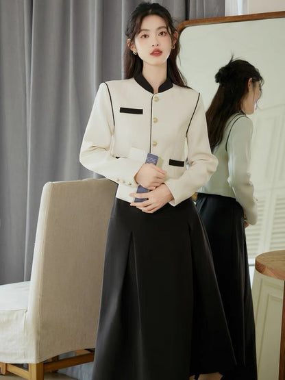 Autumn clothing is matched with a complete set of 2023 new stand-up collar long-sleeved tops and salt-style light and mature style skirts.