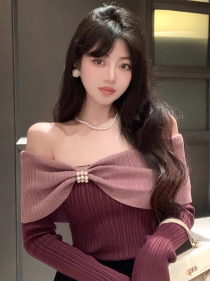 Contrast color one-shoulder lapel pearl sweater, temperament long-sleeved top, women's autumn and winter sexy slimming off-shoulder bottoming shirt