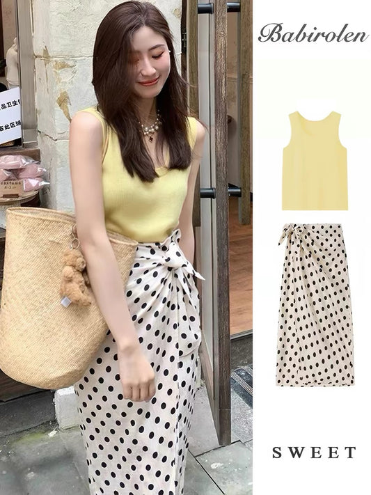 Summer French-style, niche, retro, Hong Kong-inspired A-line midi skirt set featuring a flattering polka-dot design.