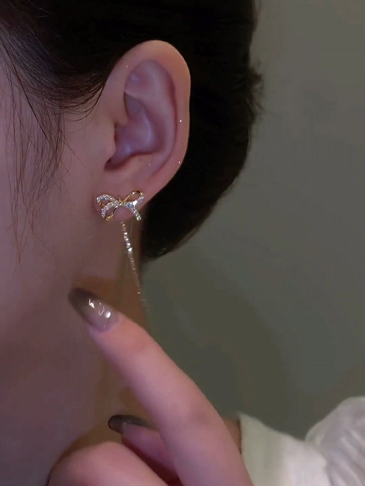 High-end golden bow earrings, long tassel earrings, elegant ear piercing earrings, 2023 new trendy women's thin
