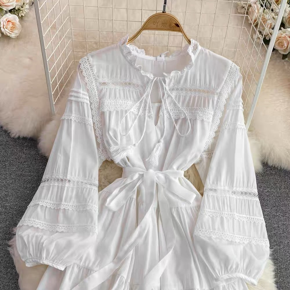 Retro palace-style round neck long-sleeved lace hollow patchwork waist A-line dress seaside vacation fairy skirt