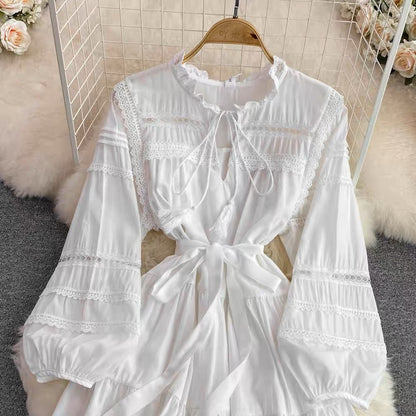 Retro palace-style round neck long-sleeved lace hollow patchwork waist A-line dress seaside vacation fairy skirt