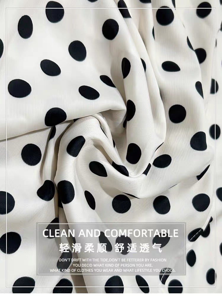 Summer French-style, niche, retro, Hong Kong-inspired A-line midi skirt set featuring a flattering polka-dot design.