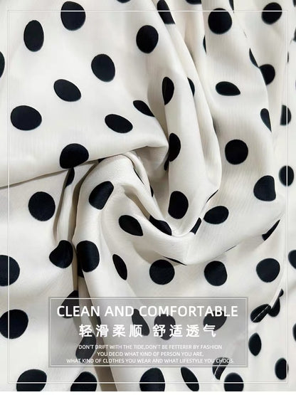 Summer French-style, niche, retro, Hong Kong-inspired A-line midi skirt set featuring a flattering polka-dot design.