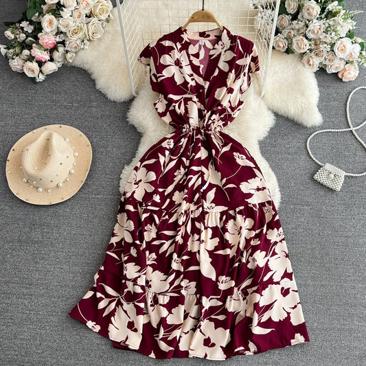 High-grade light luxury temperament flying sleeves V-neck waist slimming A-line ruffled print dress elegant long skirt