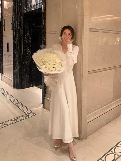 Tongse | Charming thoughts, the king of inner wear! Autumn and winter simple commuting white long skirt with coat dress