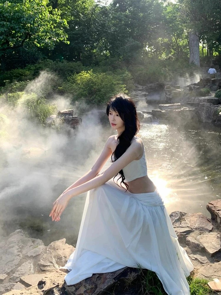 French style niche high-end cool feeling white oblique shoulder waist dress female seaside holiday atmosphere super fairy long dress