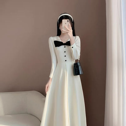 2023 new autumn clothing fashion temperament commuting v-neck splicing French slim niche design long-sleeved dress