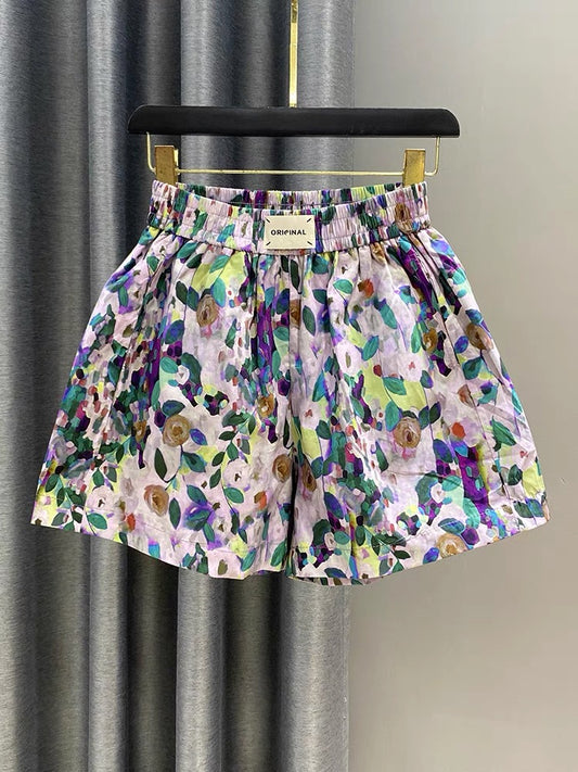 Small fresh floral wide-leg shorts for women 2023 summer new style printed age-reducing elastic waist a-line slimming hot pants