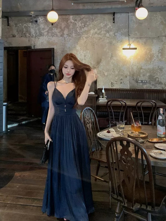 Pure desire backless v-neck suspender dress for women in summer high-end French A-line skirt pleated waist dress long skirt