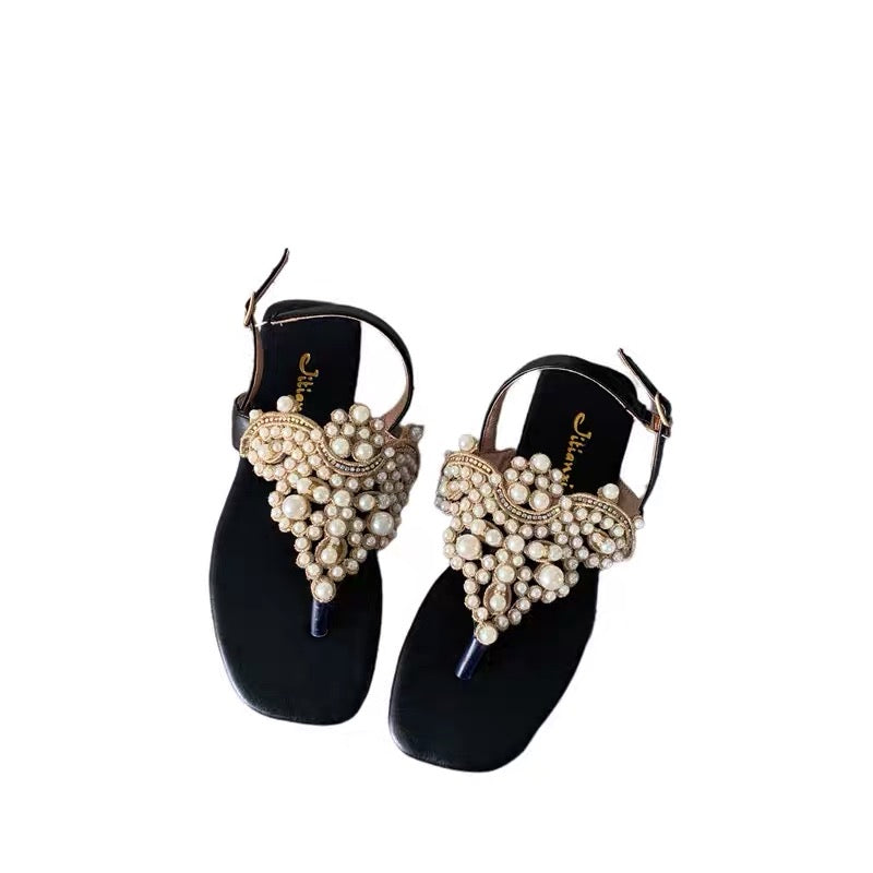 Temperament model ~ close your eyes and enter!  One word buckle strap clip toe pearl fairy sandals female clip feet rhinestone beach flat shoes