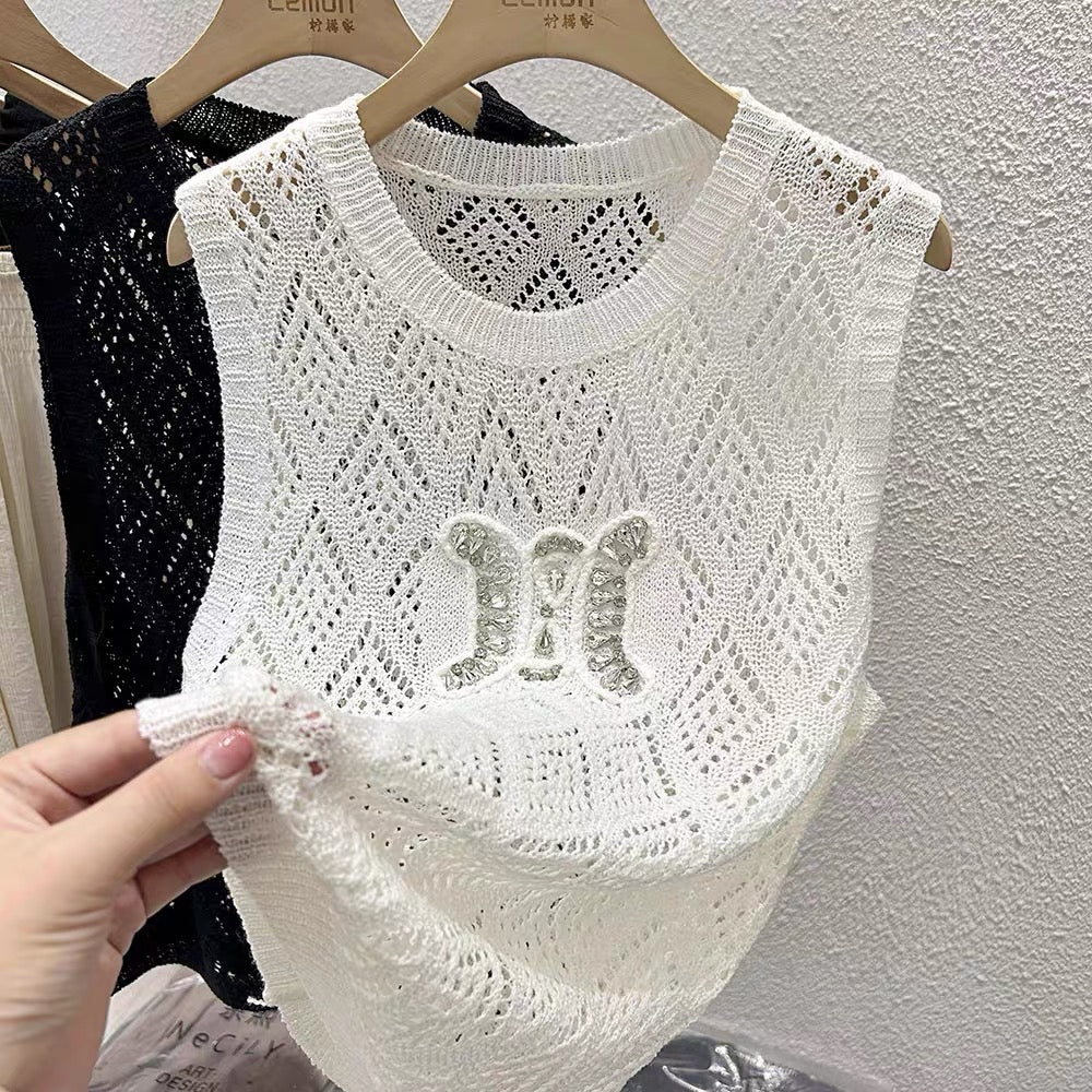 Spice girl hollow vest female design sense niche summer loose thin section outer wear round neck knitted vest sleeveless top