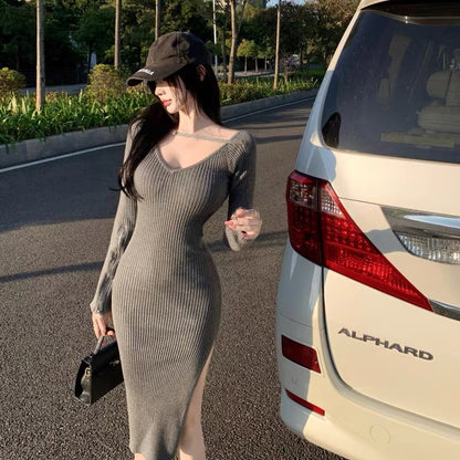 New style knitted dress for women in autumn and winter, waist slimming, long-sleeved bottoming skirt, temperament slit, hip-covering mid-length skirt