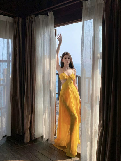 French dopamine holiday style yellow suspender dress female summer seaside sexy backless atmosphere long skirt