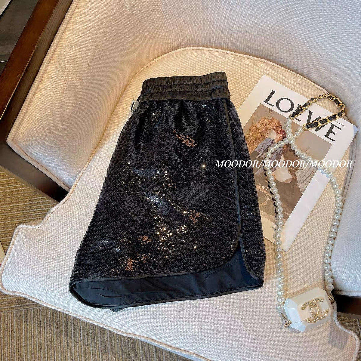 Black sequined shorts women's summer shiny elastic waist drawstring A-line fried street hot pants European high-end pants