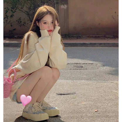 High-end and super good-looking apricot color right shoulder sweatshirt 2023 autumn and winter velvet thickened round neck top for women