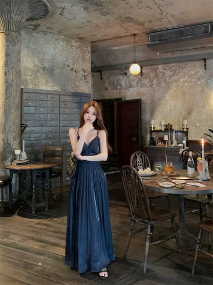 Pure desire backless v-neck suspender dress for women in summer high-end French A-line skirt pleated waist dress long skirt