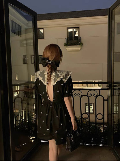 Temperament and French style puff sleeves V-neck floral dress women's summer mid-length Hepburn style waist-cinching little black dress