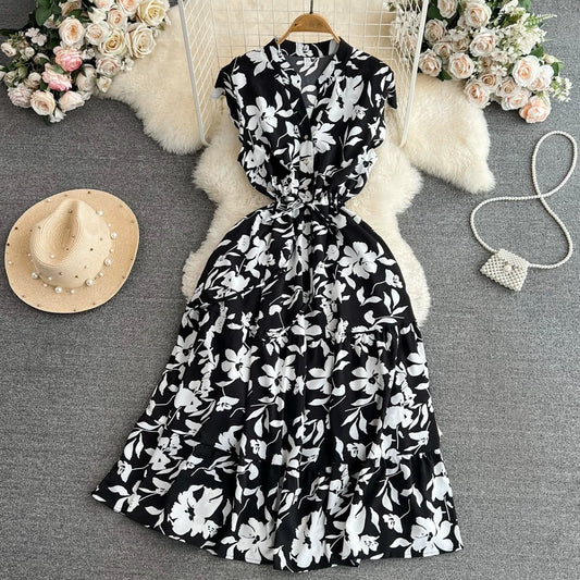 High-grade light luxury temperament flying sleeves V-neck waist slimming A-line ruffled print dress elegant long skirt