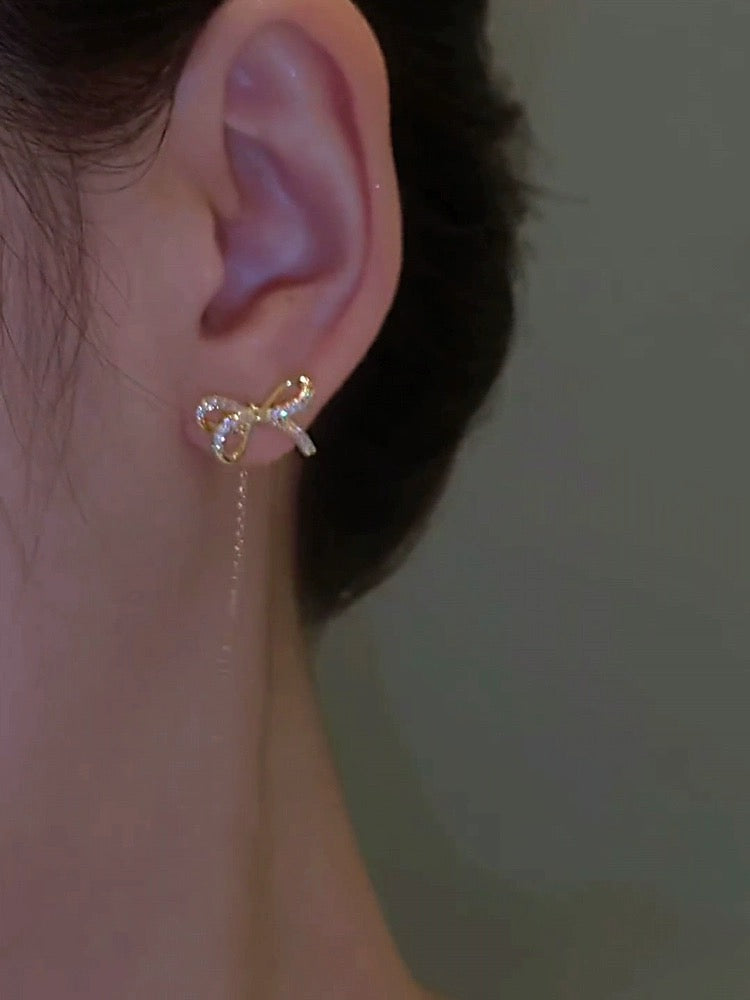 High-end golden bow earrings, long tassel earrings, elegant ear piercing earrings, 2023 new trendy women's thin