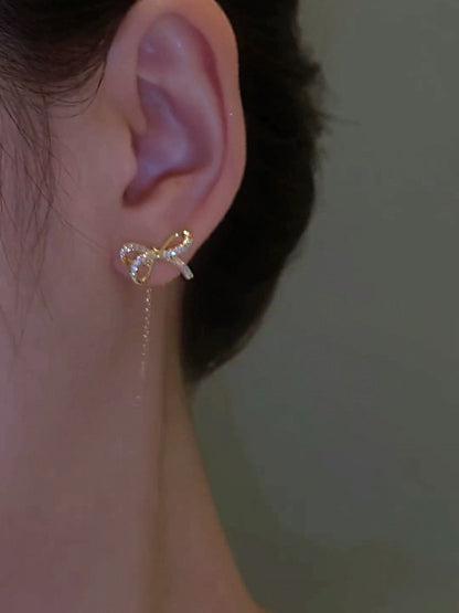 High-end golden bow earrings, long tassel earrings, elegant ear piercing earrings, 2023 new trendy women's thin