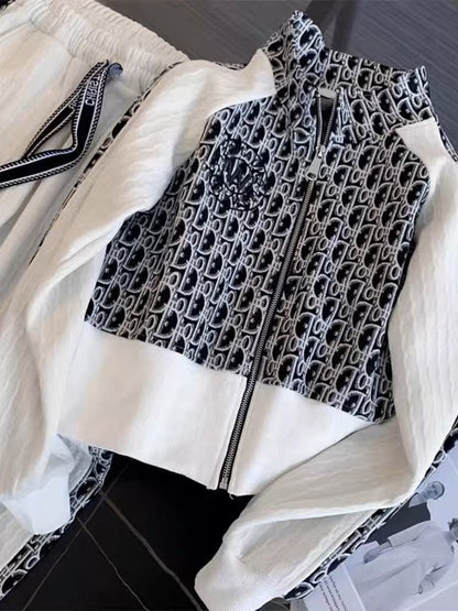 Salt style wear trendy color contrast splicing casual sports suit women's autumn stand collar sweater and trousers two-piece set