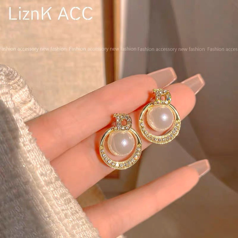 s925 silver needle unique high-end light luxury pearl earrings 2023 trendy niche design sense net red earrings ươmen