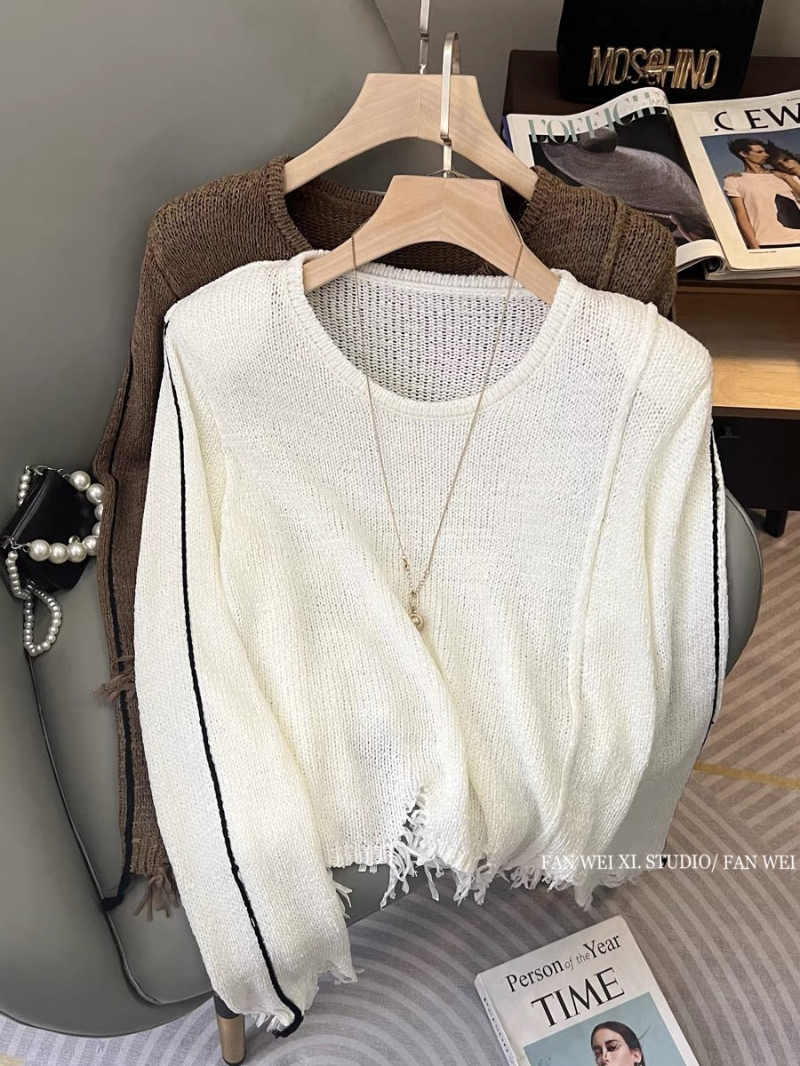 Autumn new hot girl hollow loose and versatile tassel shoulder pad pullover round neck long-sleeved sweater women's short top (B2213)