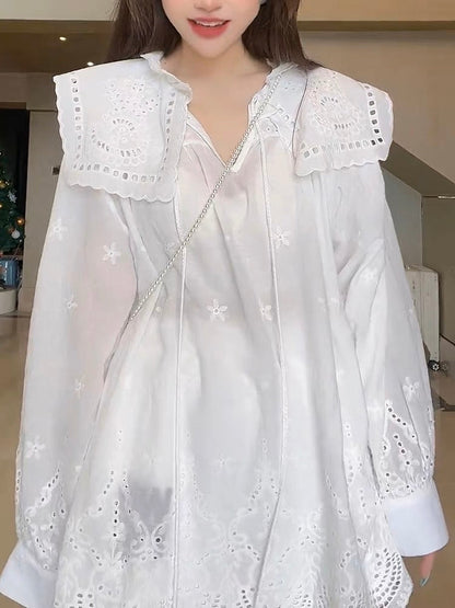 Design sense niche hollow jacquard doll collar shirt women's summer Korean casual fashion loose slim tassel top