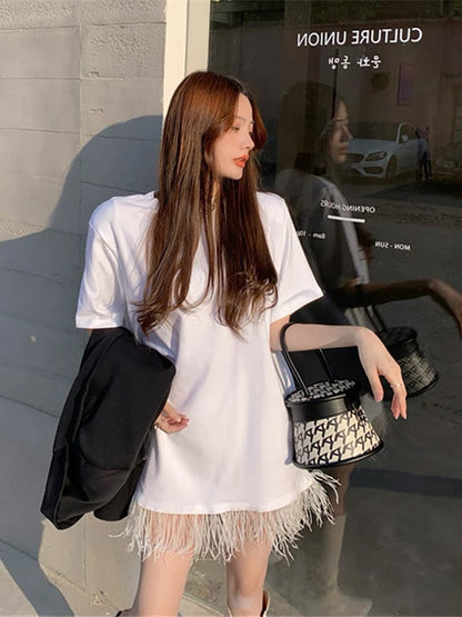 2023 new summer Korean style short-sleeved French retro Hepburn style raw edge tassel black T-shirt dress for women