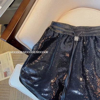 Black sequined shorts women's summer shiny elastic waist drawstring A-line fried street hot pants European high-end pants