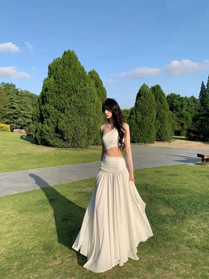 French style niche high-end cool feeling white oblique shoulder waist dress female seaside holiday atmosphere super fairy long dress