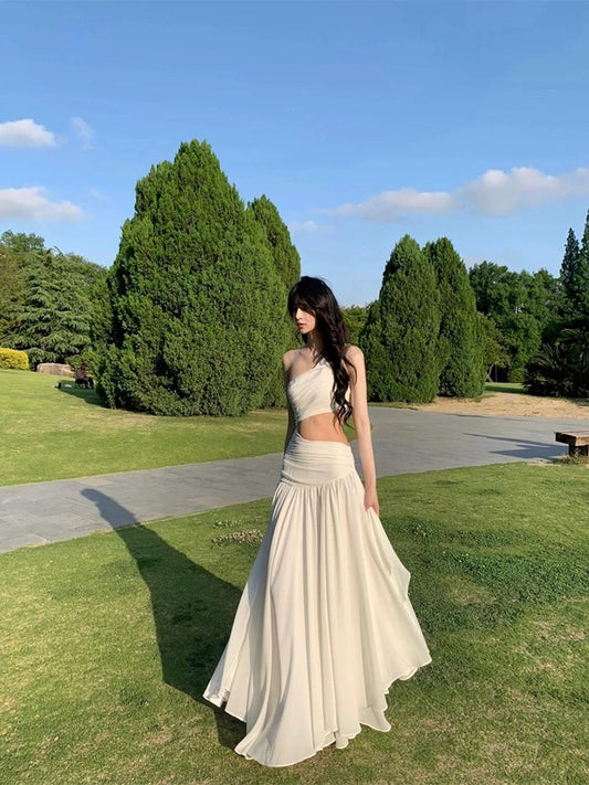 French style niche high-end cool feeling white oblique shoulder waist dress female seaside holiday atmosphere super fairy long dress
